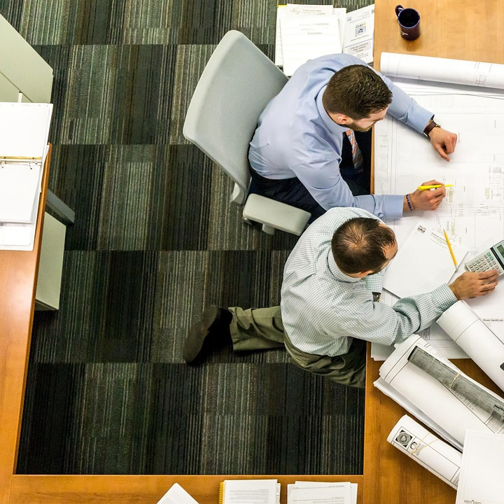 construction blueprints meeting